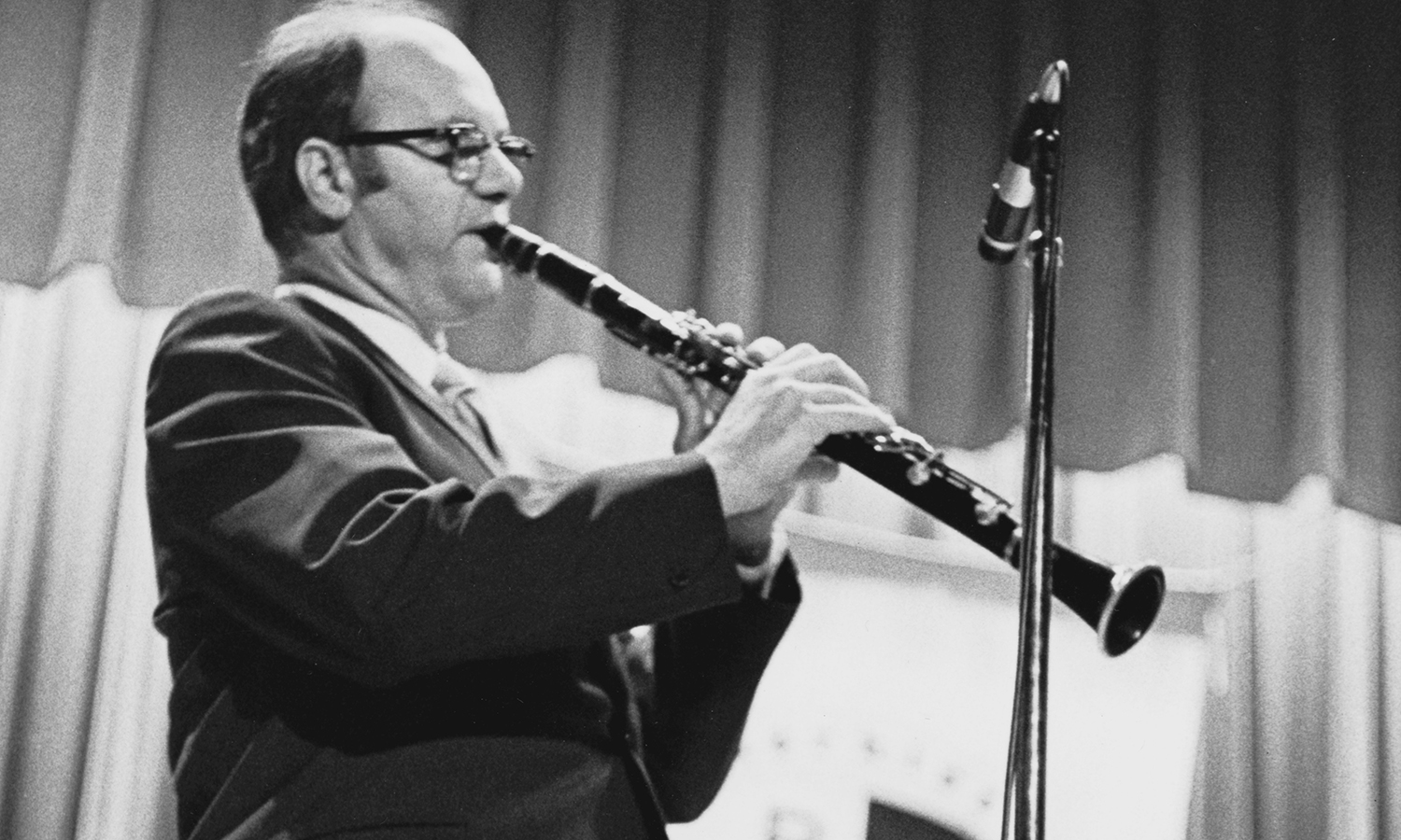 Black and white photograph of John LaPorta playing the clarinet.