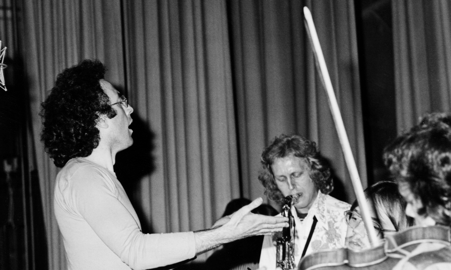 Michael Gibbs conducting an ensemble
