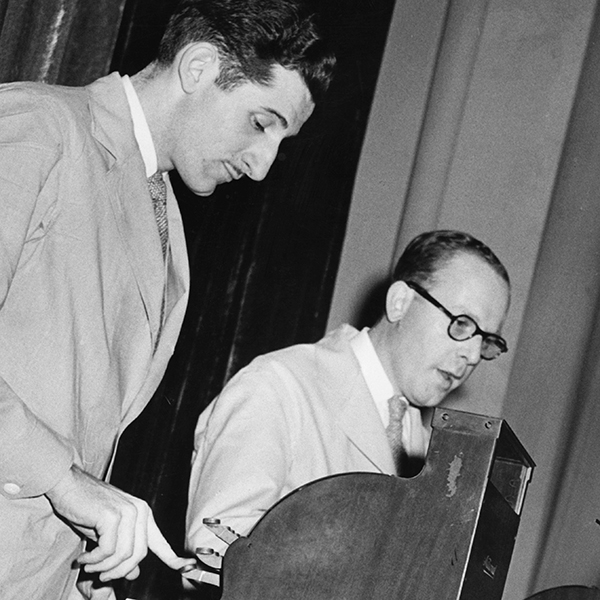 Drum teacher Sam Tully and a student play cash registers during the Filene's Basement movement of Boston Jig-Saw.