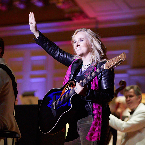 Photograph of Melissa Etheridge performing.